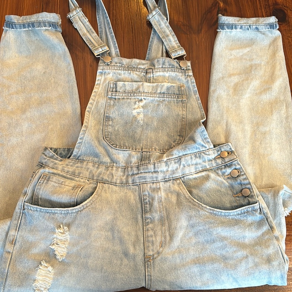 Women’s faded denim overalls
